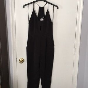 Forever21 black jumpsuit w/racer back and pockets